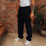 <transcy>Graue, zulaufende Jogginghose</transcy>